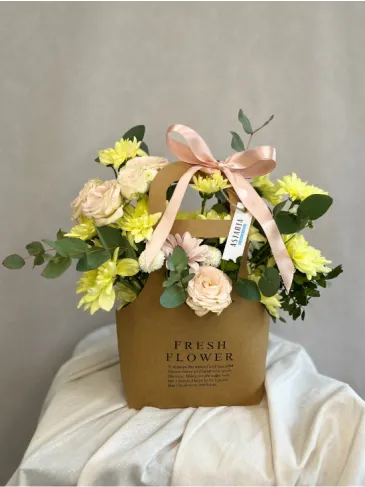 Bag with flowers in yellow tones