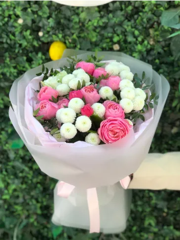 Bouquet of peony-shaped spray roses, chrysanthemums and eustoma "Juliet"