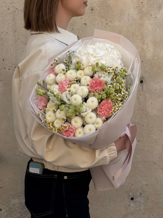 The "Aurora" bouquet with hydrangeas, chrysanthemums, lisianthus, and carnations