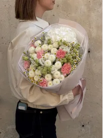 The "Aurora" bouquet with hydrangeas, chrysanthemums, lisianthus, and carnations
